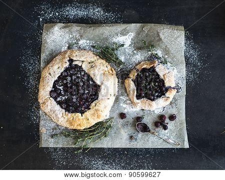 Homemade crusty blueberry pie or galette with ice-cream
