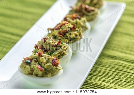 Bacon Guacamole Deviled Eggs