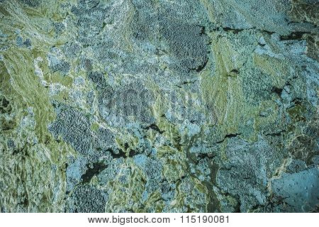 A Close Up Of The Surface Of Black Oil Pollution On Water.