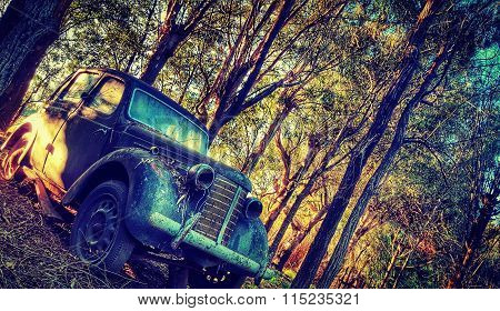 Abandoned car in the woods