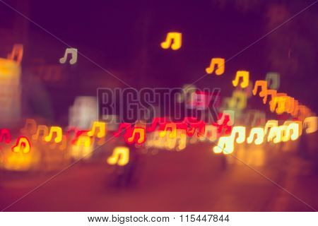 Blurring Lights Bokeh Background Of Music Notes