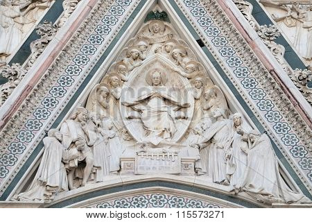 FLORENCE, ITALY - JUNE 05: Virgin Mary seated, surrounded by angels, Portal of Cattedrale di Santa Maria del Fiore (Cathedral of Saint Mary of the Flower), Florence, Italy on June 05, 2015