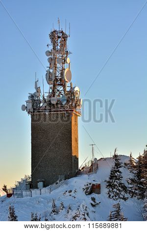 Winter Story. Sunrise At The Top Of Postavarul Mountain. Brasov Romania. Low Key, Dark Background, S