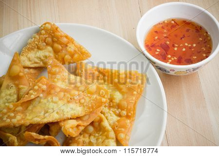 Close Up Delicious Fried Dumpling Crispy With Spicy Sauce