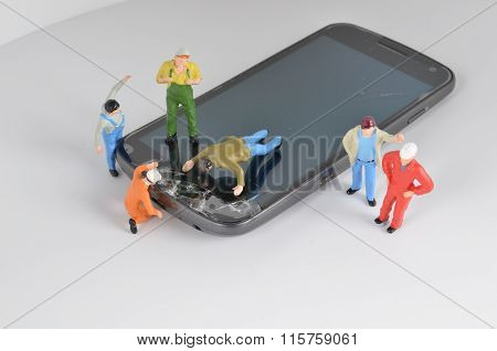 Team Of Engineers Repairing Circuit Moble Phone