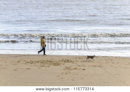 woman walking her dog