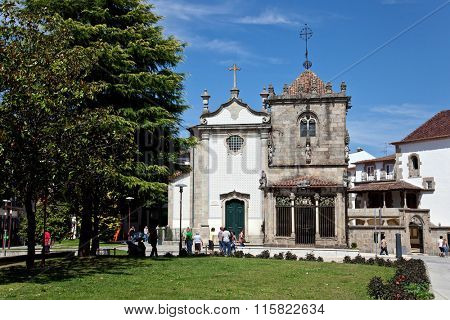Braga, Portugal - July 27, 2015: Sao Joao do Souto Church (left) and Coimbras Chapel (right). Medieval religious architecture.