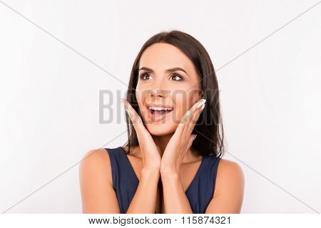 Surprised Cute Businesswoman Touhing Her Face