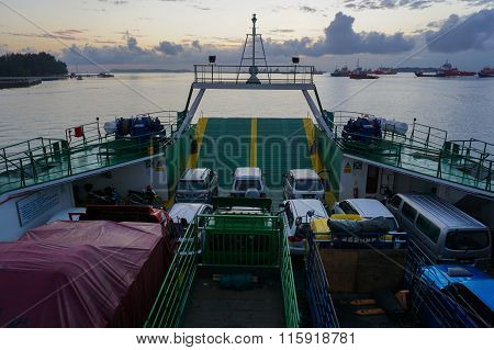 Ferry with vehicles on board in the morning,carries passengers and vehicle