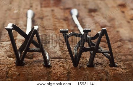 Two Rustic Branding Irons For Cattle