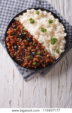 Picadillo A La Habanera With Rice On The Table. Vertical Top View
