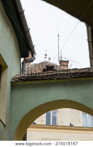 Quiet street leaving the Fortress Square in the castle of old city. Sighisoara city in Romania