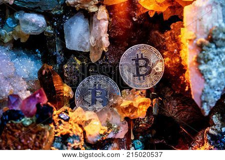Silver bitcoin in a cave of precious stones. Bitcoin cryptocurrency.