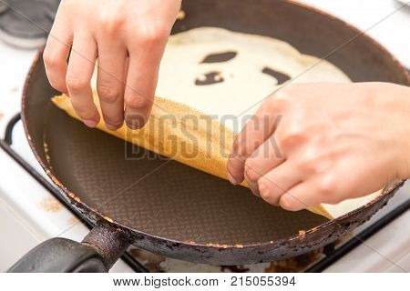 pancakes in a frying pan . Photos in the studio
