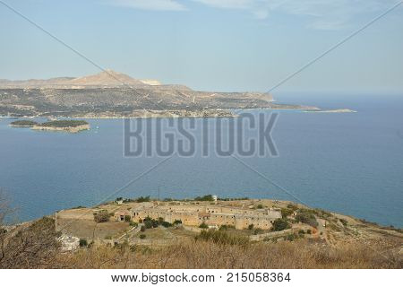The view of Intzedin Fort, a former Greek political prison and execution site, and Souda Bay harbour to Akrtiri peninsula