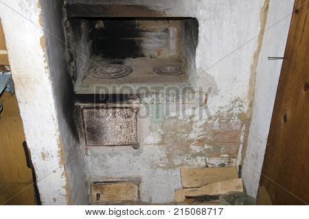 old Russian brick stove in the old Russian house