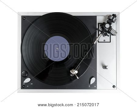 Aerial view top down onto a playing vinyl record on vintage hi-fi stereo turntable isolated against white background