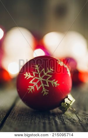 Christmas Bauble On Rustic Wooden Board