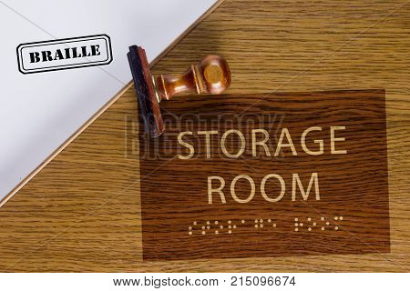 Sign of warehouse with braille on a poster with a stamp