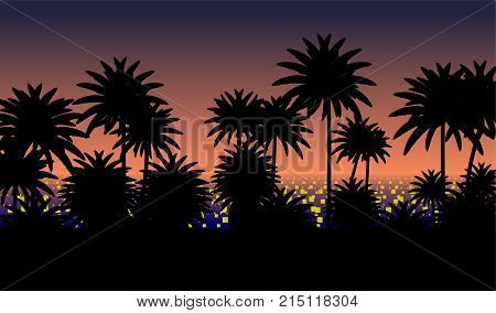 Sunset against a background of cityscape with silhouettes of palms
