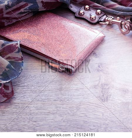 Set of fashion accessories for women. Handkerchief cosmetic bag purse watch bracelet top View flat lay