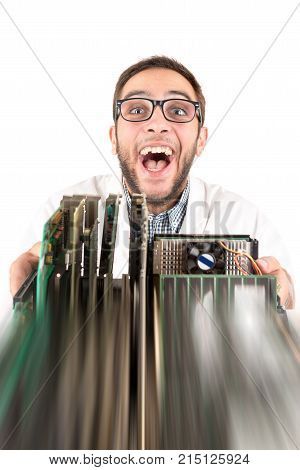 Nerd engineer posing with computer components isolated in a white background
