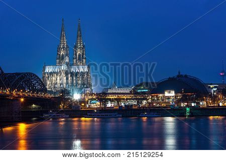 Bridge Over The Rhine River In Cologne At The Early Morning Blue Hours Sun Light