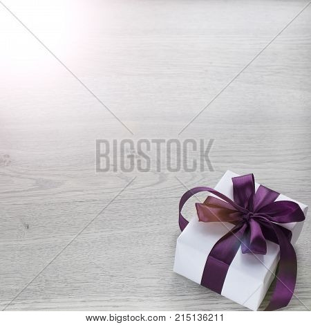 Gift boxes decorated with satin ribbon. The festive lights. Top view flat lay