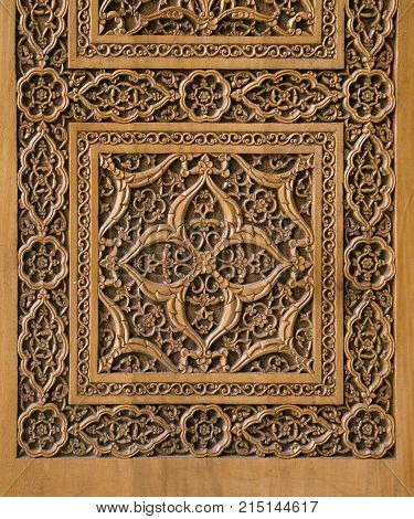 Close-up of a traditional carved wooden door, Uzbekistan