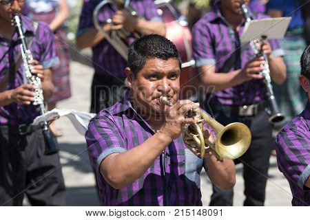 March 24, 2016 San Pedro la Laguna, Guatemala: a male marching band plays funeral music during Easter Week procession