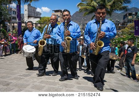March 23, 2016 San Pedro la Laguna, Guatemala: members of a marching funeral band performing during Easter Week celebration