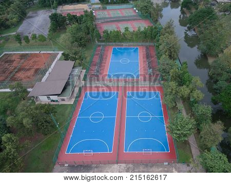 football tennis basketball pitch concrete in the park drone top view