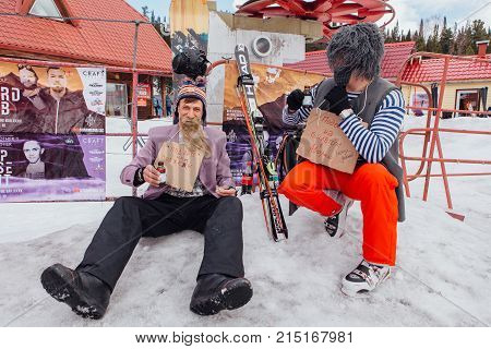 Sheregesh, Kemerovo region, Russia - April 22, 2017: Grelka Fest is a sports and entertainment activity for ski and snowboard riders in carnival costume. Young people in carnival costumes.