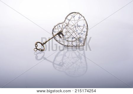 Heart Shaped Metal Cage On White