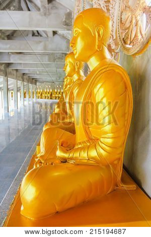 Golden Buddha statue meditation in measure Thailand.