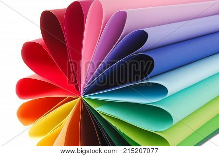 closeup of color colorful paper texture folded roll