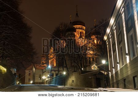 Tallinn OLd Town Street with View on Aleksander Nevski Cathedral at Winter Night, Rstonia.