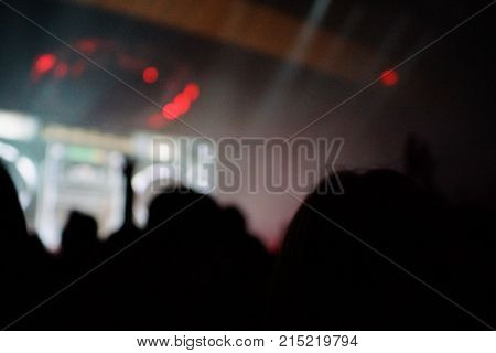 Texture Blur Scene Multicolored Lights And Smoke In Concert With Silhouettes Of Peoplebackground For