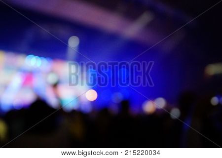 Texture Blur Scene Multicolored Lights And Smoke In Concert With Silhouettes Of Peoplebackground For