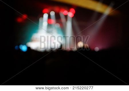 Texture Blur Scene Multicolored Lights And Smoke In Concert With Silhouettes Of Peoplebackground For
