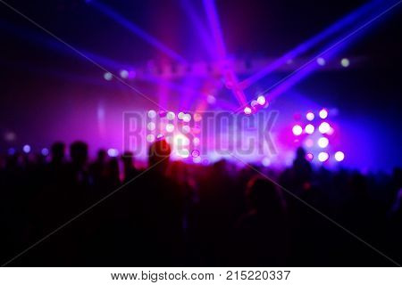 Texture Blur Scene Multicolored Lights And Smoke In Concert With Silhouettes Of Peoplebackground For