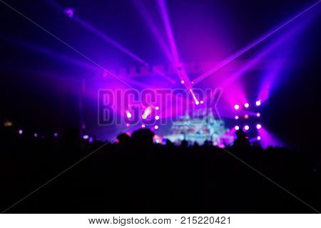 Texture Blur Scene Multicolored Lights And Smoke In Concert With Silhouettes Of Peoplebackground For