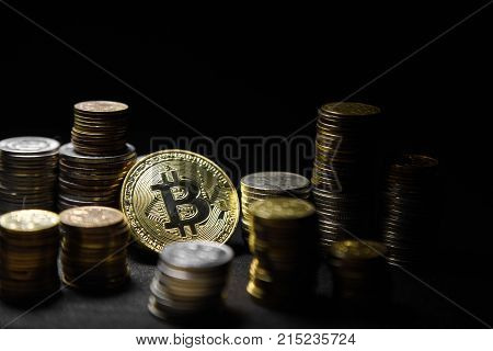 Photo Golden Bitcoins new virtual money on black background