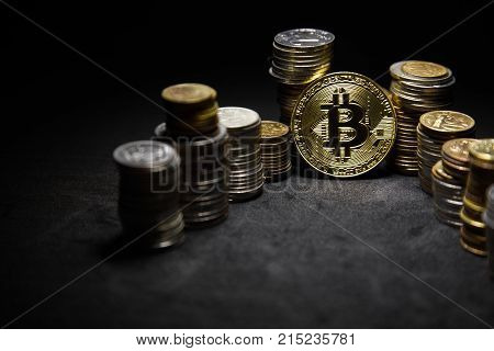 Photo Golden Bitcoins new virtual money on black background