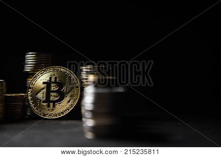 Photo Golden Bitcoins new virtual money on black background