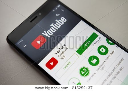 Berlin Germany - November 19 2017: YouTube application on screen of modern smartphone. Install menu of YouTube app in Play Store