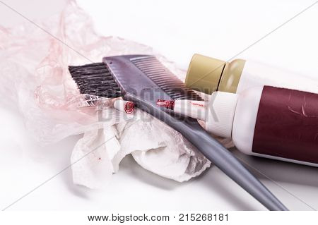 Close-up Of Chemical Hair Color Dye Set With Comb Brush