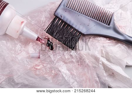 Close-up Of Chemical Hair Color Dye Set With Comb Brush