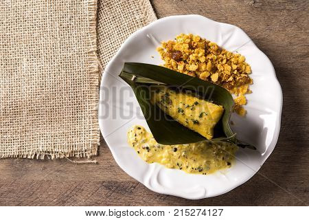 Fried Fish With Farofa And Passion Fruit Sauce - Traditional Amazonian Dish - Filhote Caboclo
