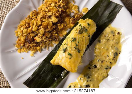 Fried Fish With Farofa And Passion Fruit Sauce - Traditional Amazonian Dish - Filhote Caboclo